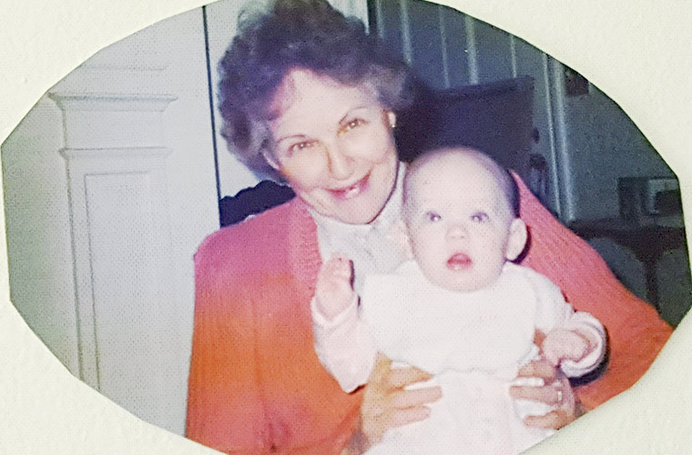 Pink Grandma holding me as an infant—I was sick with a cold and ear infection